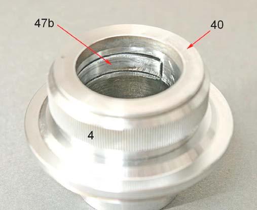 Fig. 2391 Vista dall interno, la linguetta elastica 47b. All estremità inferiore del tubo, in genere, si trova qualche meccanismo per la sostituzione dell obbiettivo.