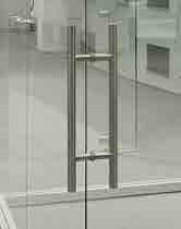 Sliding doors, whether solid or in glass, with ceiling rails connected to an aluminium top track. Doors with frame or frameless, pivot doors fixed to floor and ceiling.