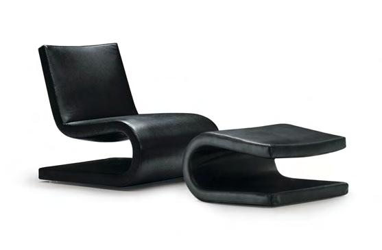 The Snake armchair is provided with rotating base and optional footrest. Sopra: poltrona girevole e poggiapiedi Snake con rivestimento in pelle, design Roberto Lazzeroni.