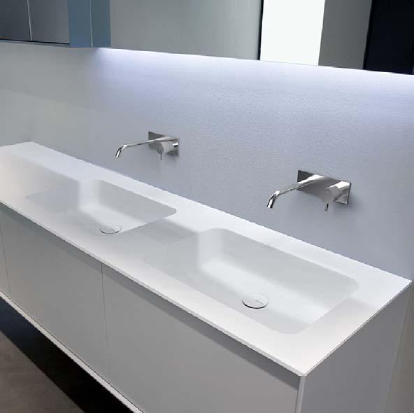 Descrizione: Top con doppio lavabo integrato soprapiano in Corian spess. 12 mm, completo di piletta con scarico libero e raccordo per sifone. N.B. solo per porta lavabi H 3 e H 50 cm.