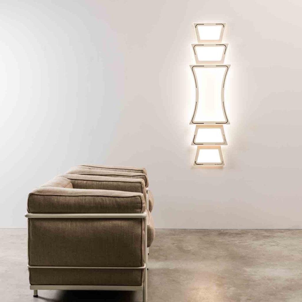 CLOTILDE Lampada a LED da parete a diffusione. Corpo in alluminio personalizzabile con inox in diverse finiture o verniciato in vari colori secondo palette RAL.