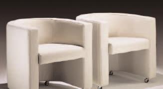 Plywood upholstered in leather,structure in polished chrome-plated steel.