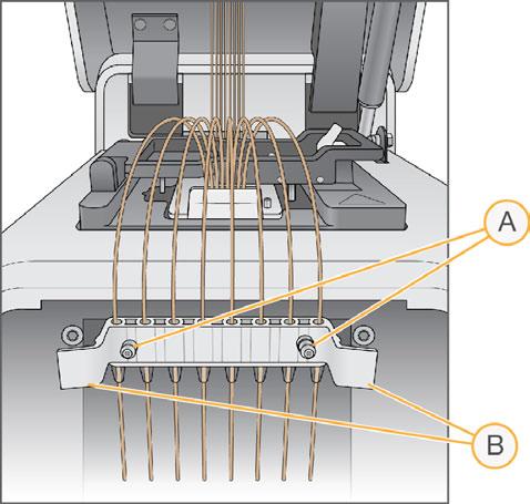 10 Allineare il pettine di aspirazione ai due perni guida metallici sul lato anteriore del blocco termico.