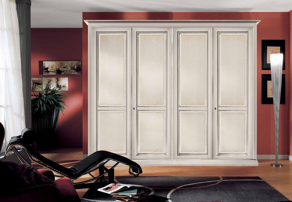 Zona notte Bedroom area Zona notte Bedroom area Art. 1168/P Armadio 4 ante bugnate laccato bianco. Wardrobe 4 beveled doors white lacquered. cm. L. 290 - P. 69 - H. 250 Art.