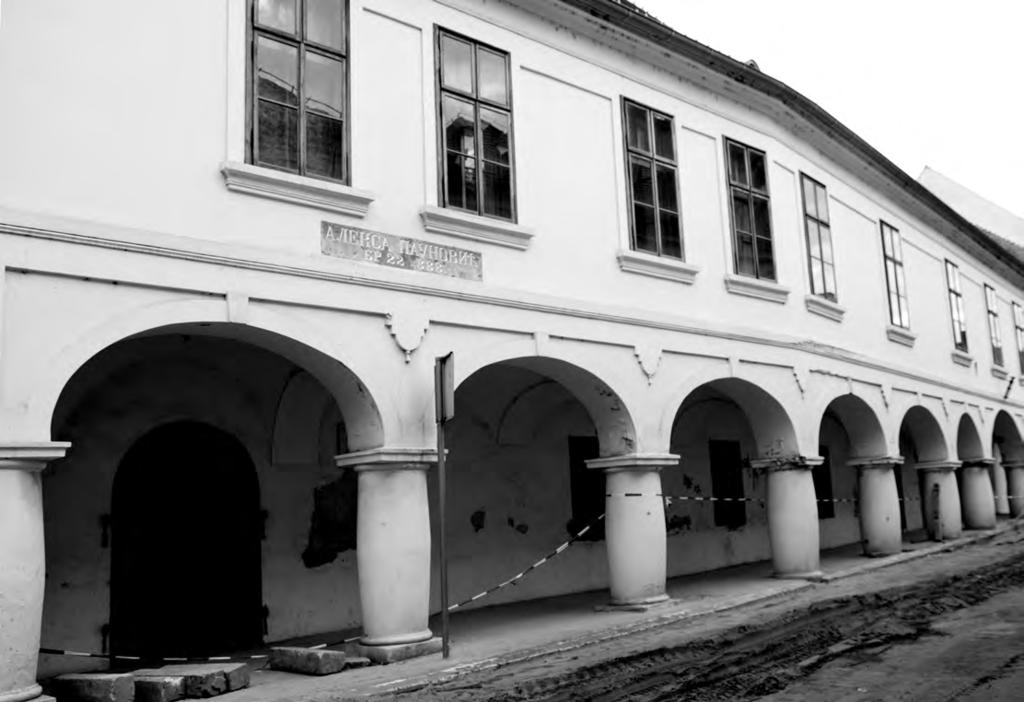 REPORTAŽA Natpis na jednoj od zgrada u centru Vukovara, Aleksa Paunović br 22 888 Zato planiramo da organizujemo Dane Srba u Vukovaru na kojima ćemo predstaviti našu kulturu, tradiciju, običaje i