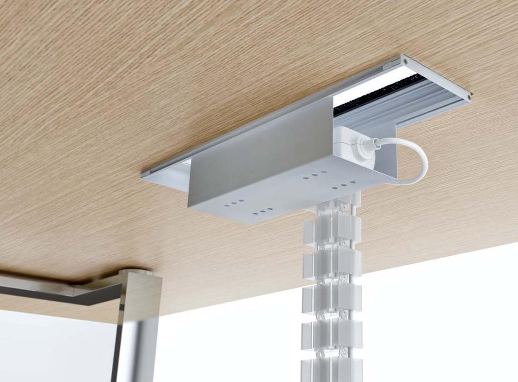 A flip top is available for meeting tables and comes with a receiving trough for horizontal cable management. A plastic vertebra is provided for the vertical wiring management.