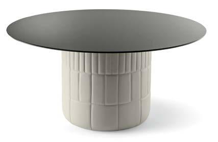metropolitan tavolo - table metropolitan tavolini - coffee tables Tavolo tondo con basamento in legno massello imbottito, rivestito in pelle.