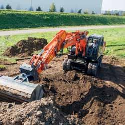 Lo ZX220W-5 è equipaggiato con un filtro di scarico che cattura e brucia le sostanze inquinanti dell aria, con un catalizzatore e il controllo della temperatura dello scarico.