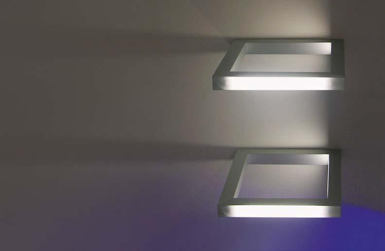wall-ceiling light for interiors IP20 in extruded matt oxidised aluminium. houses two 6W fluorescent tubes T2 connection W4,3X8,5d.
