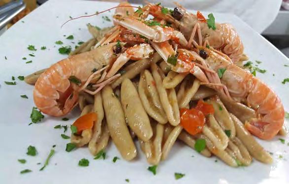 PRIMI PIATTI Garganelli di grano arso agli Scampi