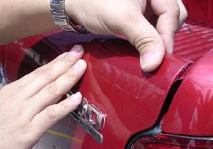 protective strip (supplied in the fitting kit) along the area where the sport cover's rubber seal rests on the vehicle's tailgate.