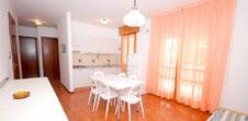 tromi apartmány PUERTO DO SOL*** Lignano Sabbiadoro lôžkami, obývacia miestnosť s rozkladacími lôžkami resp. gaučami pre 2 resp.