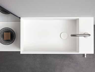 iletta sporgente in Corian inclusa. The shape of this washbasin can perfectly match the drawer underneath.