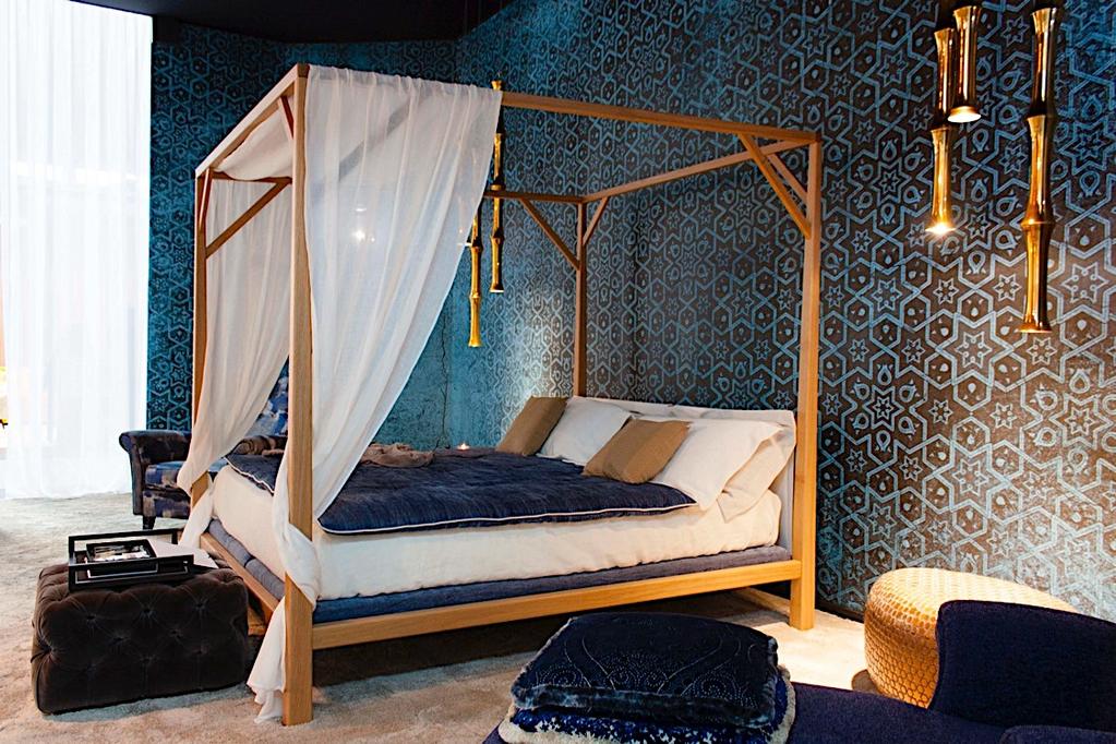 Four-poster bed made entirely of tech wood that evokes the branches of a tree by directing it to a sophisticated