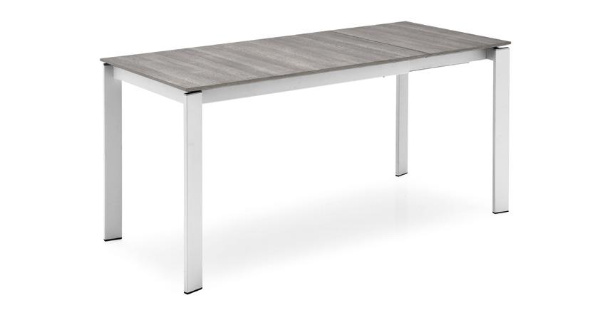 Modular table with metal frame, legs in solid beech wood or metal, which can be matched with laminate, melamine or tempered frosted glass top.