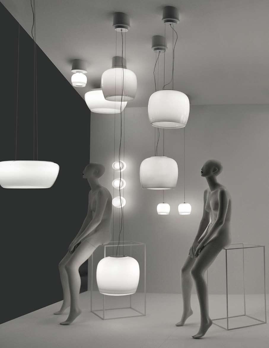 52 implode Design Gregorio Spini 2011 53 Collezione di lampade in vetro soffiato bianco lucido con forte spessore di cristallo. Tonalità vetro: bianco lucido. Parti metalliche: bianche.
