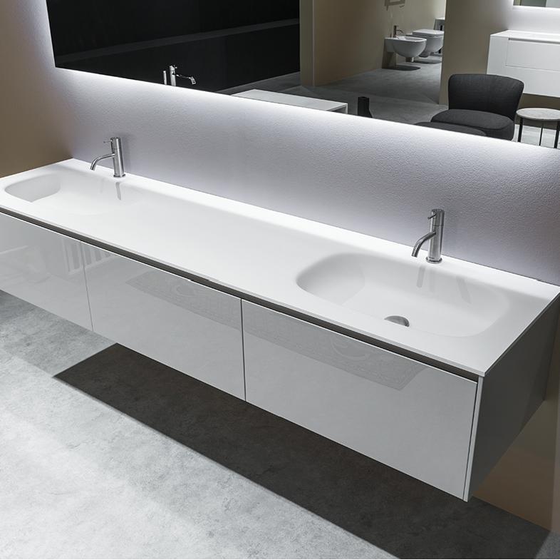 NUVOA Materiale: Flumood Descrizione: Top con doppio lavabo integrato in Flumood spessore 12 mm, completo di piletta con scarico libero e raccordo per sifone. N.B.