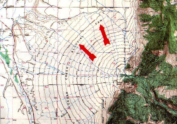 Riconoscimento di un conoide alluvionale su carta topografica Un conoide alluvionale si riconosce