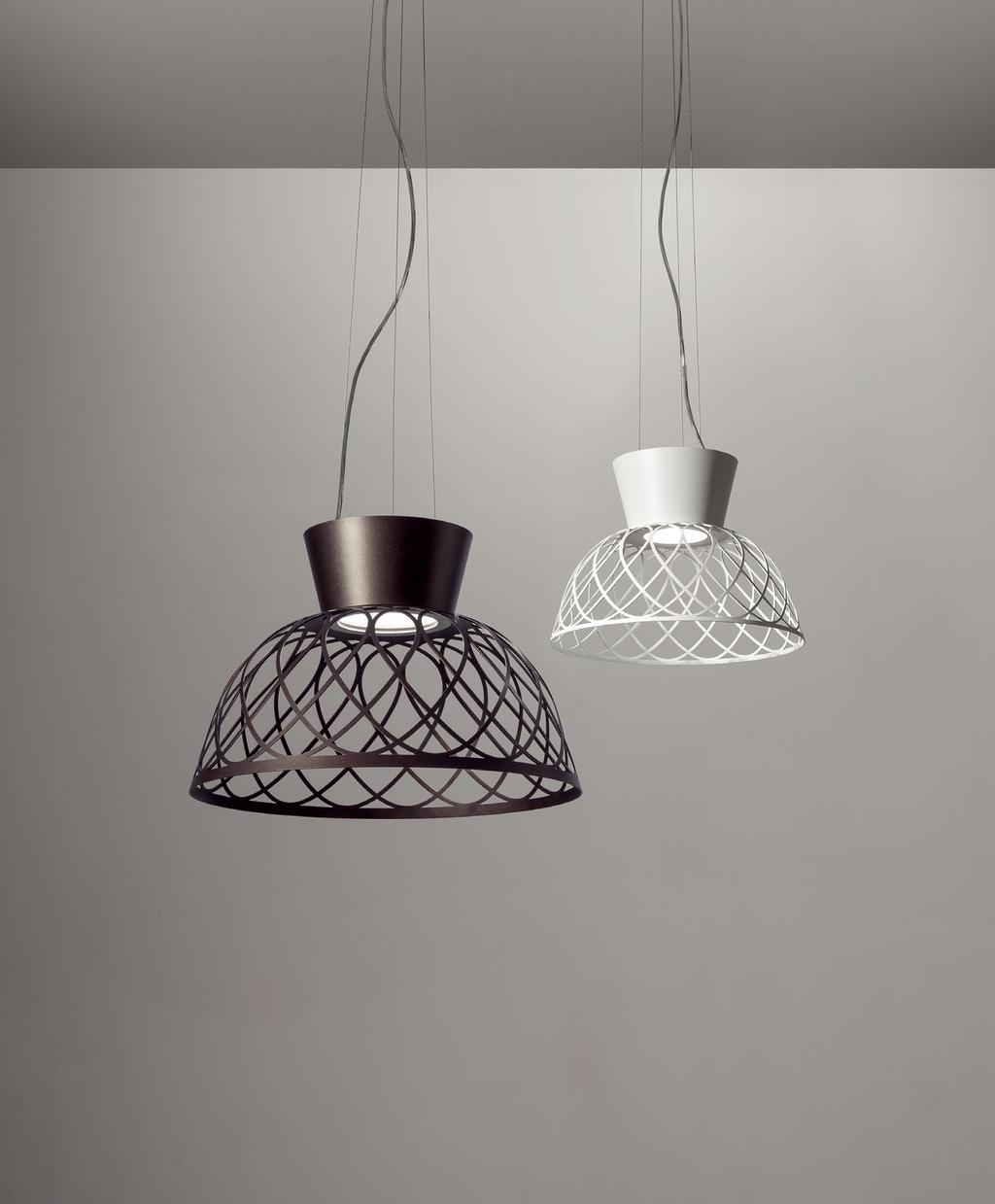 4 / 5 itama / collection collection [En] > Braidings of light. is a suspension lamp characterised by a metal dome enriched by a complex laser cutted ornament.