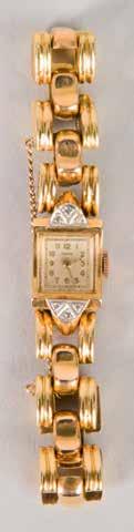 362 364 362 Orologio da polso da donna, a carica manuale, in oro giallo 18Kt con diamanti taglio 8/8 di marca Marvin. Peso gr. 27,3.