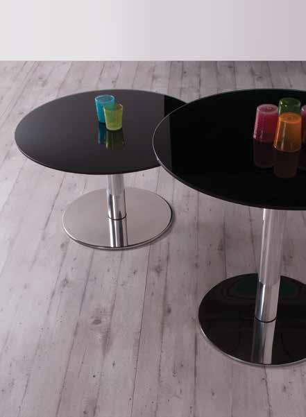 Height adjustable table with glass top, chromed metal base, gas lifting, available in two heights. Available in fixed version upon request.