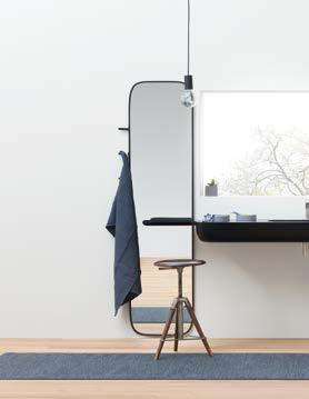 Mirror with Corian frame and hooks ideal to hang up towels, bracelets or necklaces.