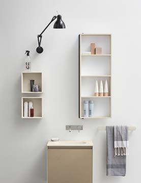 The mirror turns and becomes a functional compartment to hold objects, soaps, skin creams and perfumes.