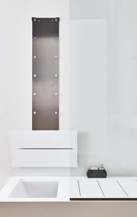 Unico bathtub/shower system in Corian, has been invented and patented by Rexa Design.
