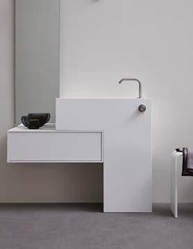 Unico Argo a forma a del lavabo può accogliere il cassetto. Gli angoli interni del lavabo in Corian con finitura setosa opaca realizzata a mano, sono raggiati.