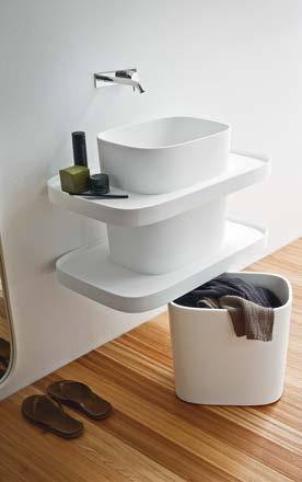 Corian freestanding basin available with or without trays, inspired by the japanese style, where every object is freely displayed. Recessed Drain plug in Corian included.