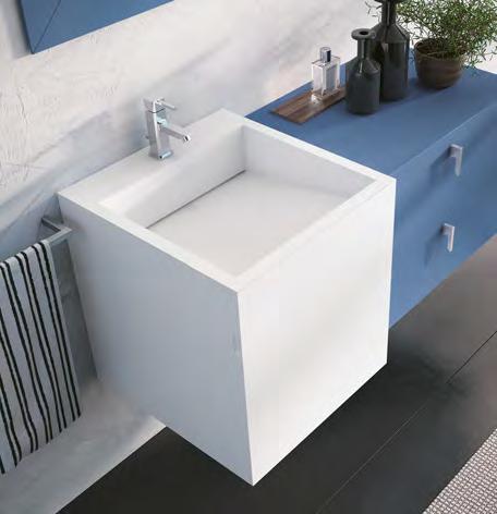 The timeless minimalism of the FUNKY monolithic washbasin is enhanced by the slit drain and elegantly coordinated cube