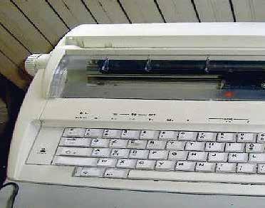 1 tavolinetto per macchina da scrivere.