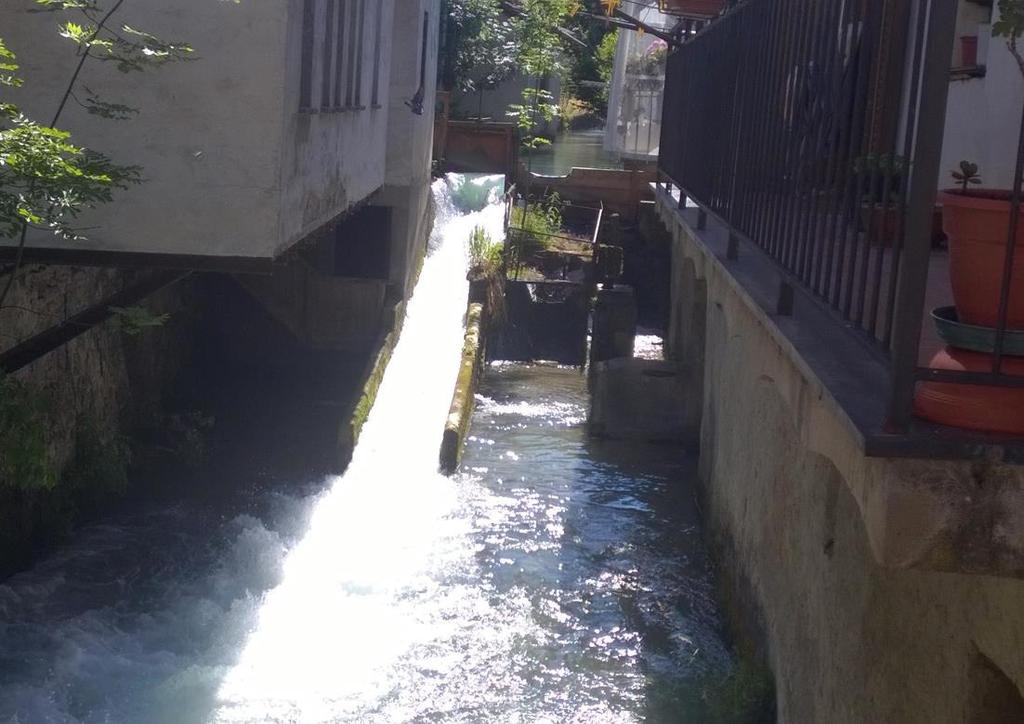 Foto 5_Vista a valle dello sbarramento esistente SBARRAMENTO FISSO FABBRICATO DI CENTRALE SCARICO BY-PASS CANALE MARCHISA Il presente progetto prevede di mantenere sostanzialmente invariate le opere