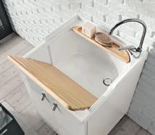 The pull-out laundry basket with metal frame, the board for washing by hand, and the wooden