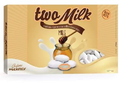 TWO MILK FIOR DI LATTE Un anima di cioccolato bianco avvolta da un secondo strato di cioccolato bianco al gusto di fior di latte ricoperta da un sottile strato di zucchero.