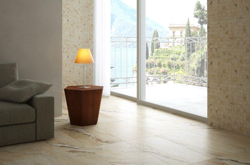 IN LAVORAZIONE The large slabs on the floor and the mosaic tiles on the wall are an ideal solution for the contemporary living area.