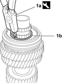 1. Posizionare l'anello del sincronizzatore (1a) e poi montare il manicotto del sincronizzatore (1b). 1.