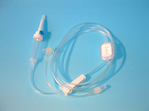 Polyurethane set with flow regulator and secondary access way endowed of needle free vascular access.