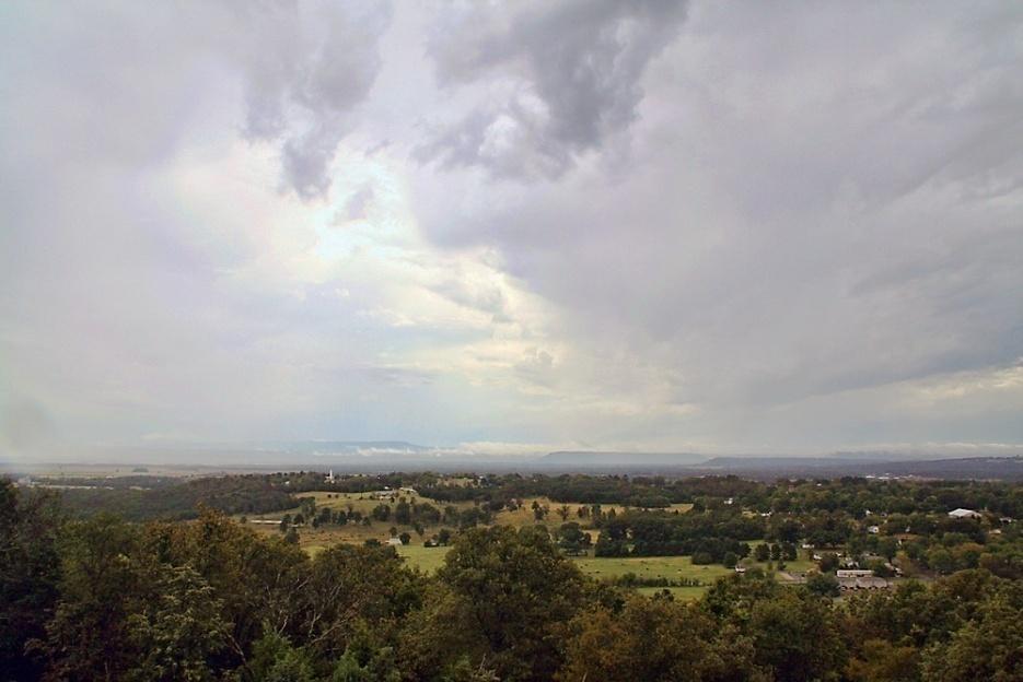 A series of valleys between the Ozark and Ouachita mountains through which the Arkansas River flows. Section of the Arkansas River Valley seen from atop St.