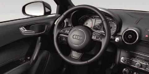 Audi A1 design in nero Mythos con arco del tetto, specchietti retrovisivi esterni e spoiler posteriore in grigio Daytona