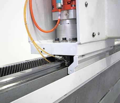 STRUCTURAL FEATURES The "Z" axis for the spindle vertical positioning slides on recirculating ball guides and is driven by a digital brushless motor assembly that controls the rack and pinion