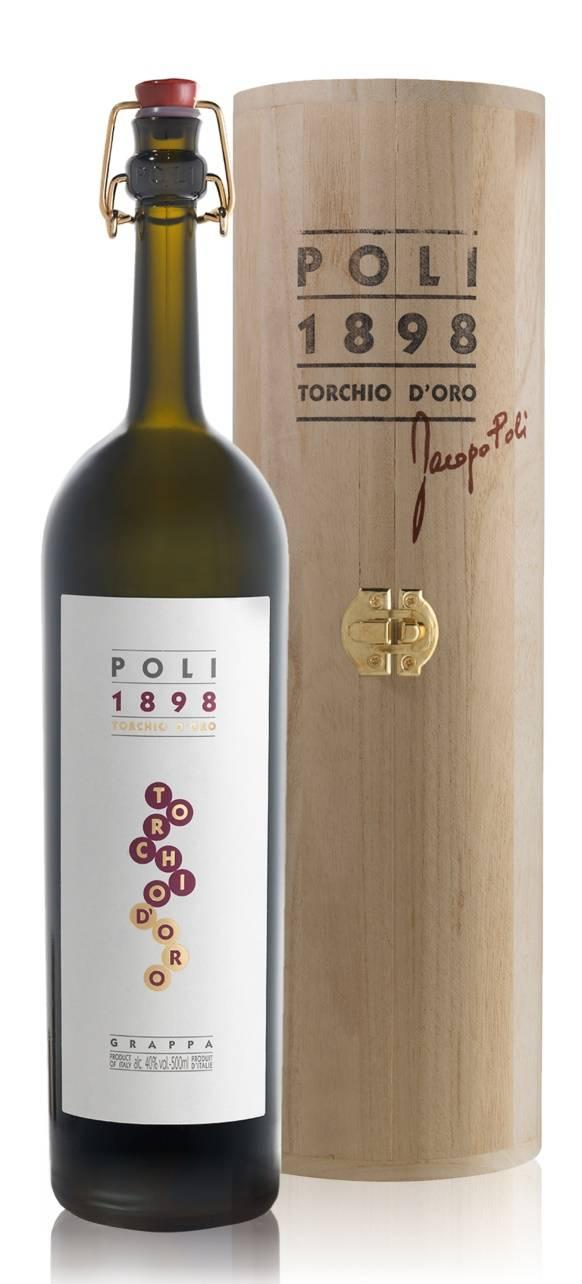 TORCHIO D ORO Grappa singolo vitigno maturata in legno Vinaccia di uve dall'aroma fruttato e di uve passite di Vespaiolo per vino Torcolato Artigianale, a piccoli lotti, con alambicco in rame con