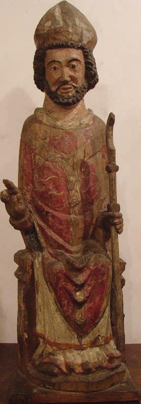 Scultura in legno Vescovo in trono rappresentato con la barba. Nella mano sinistra regge il pastorale. Tracce di policromia. Già collezione Bernahrd Fahr di Stoccarda.