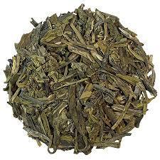 Questo tè presenta delle foglie lunghe e piatte con un colore che varia dal verde al verde scuro. Il suo gusto presenta accenni speziati e note di castagno.