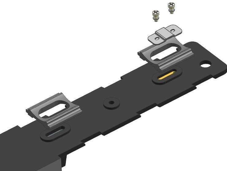 Incastrare i gommini antivibrazione (25) sulla parte inferiore del supporto batteria (21), posizionare la piastrina porta