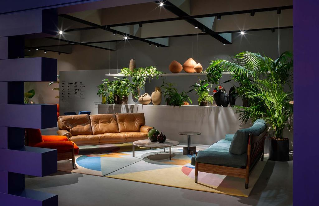 22 Sella (cat. Sofa, Armchair) designed by Carlo De Carli (2019). Joaquim (cat. Low Table) designed by Giorgio Bonaguro (2019), top Elegant Brown Marble.