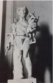(id 386) Statuetta di pastore barbato in tunica corta con