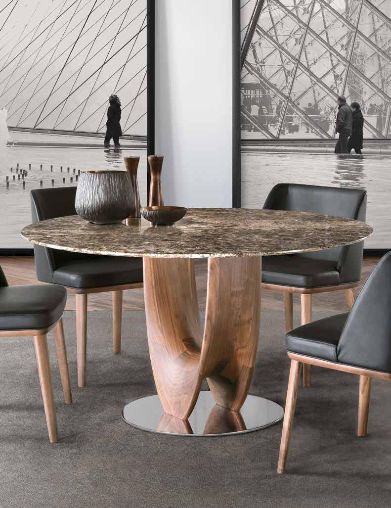 Finiture disponibili: WG wengé, TN tinto nero, NC noce, TB tabacco, NK noce canaletto, Laccato opaco poro aperto.. Dining table with base in solid canaletto walnut or ash.