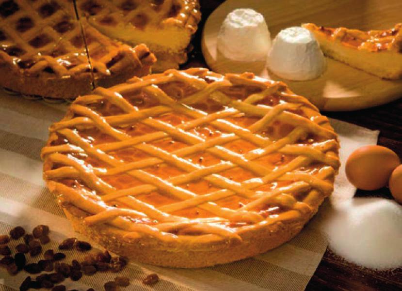 CROSTATA DI RICOTTA Pasta frolla farcita con ricotta e uvetta, ricoperta di gelatina.