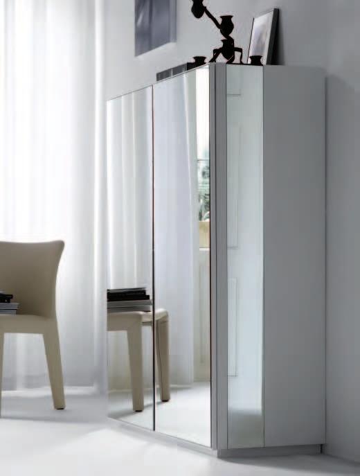 Polished white or black laquered sideboard with mirrored glass bands. Laquered doors with mirrored glass fronts.